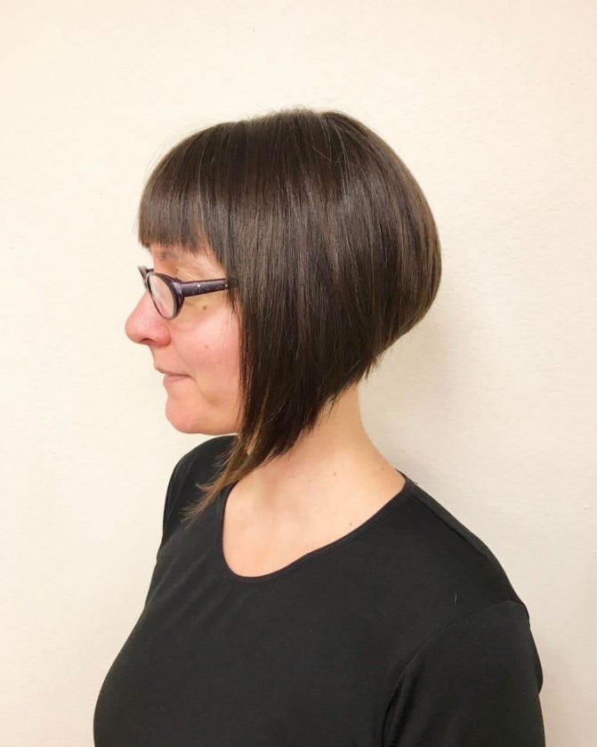 Modern-A-line-bob-with-bangs-and-ultra-sleek-straightened-Hairstyle-For-Women-Over-50